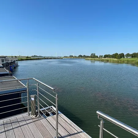 Hotel na wodzie Hausboot-see-rad-sups-meer-familie-urlaub! Schillig