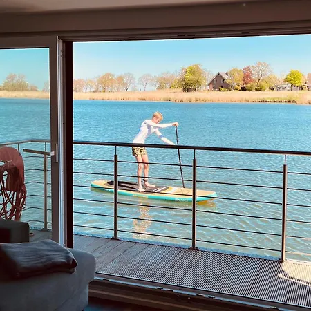 Hausboot-see-sups-dachterrasse-familie-meer!